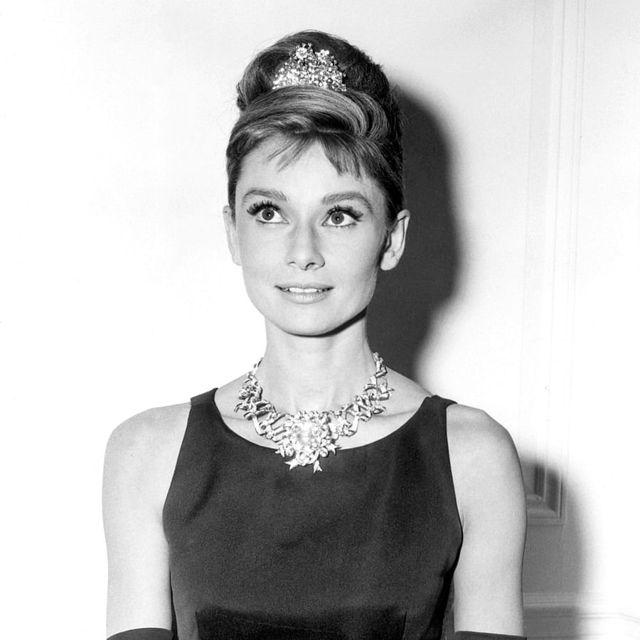 Classic Audrey Hepburn wearing Tiffany\'s jewelry