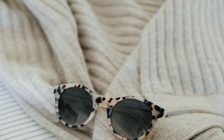 What are some affordable alternatives to designer sunglasses available on Dupe Designer?